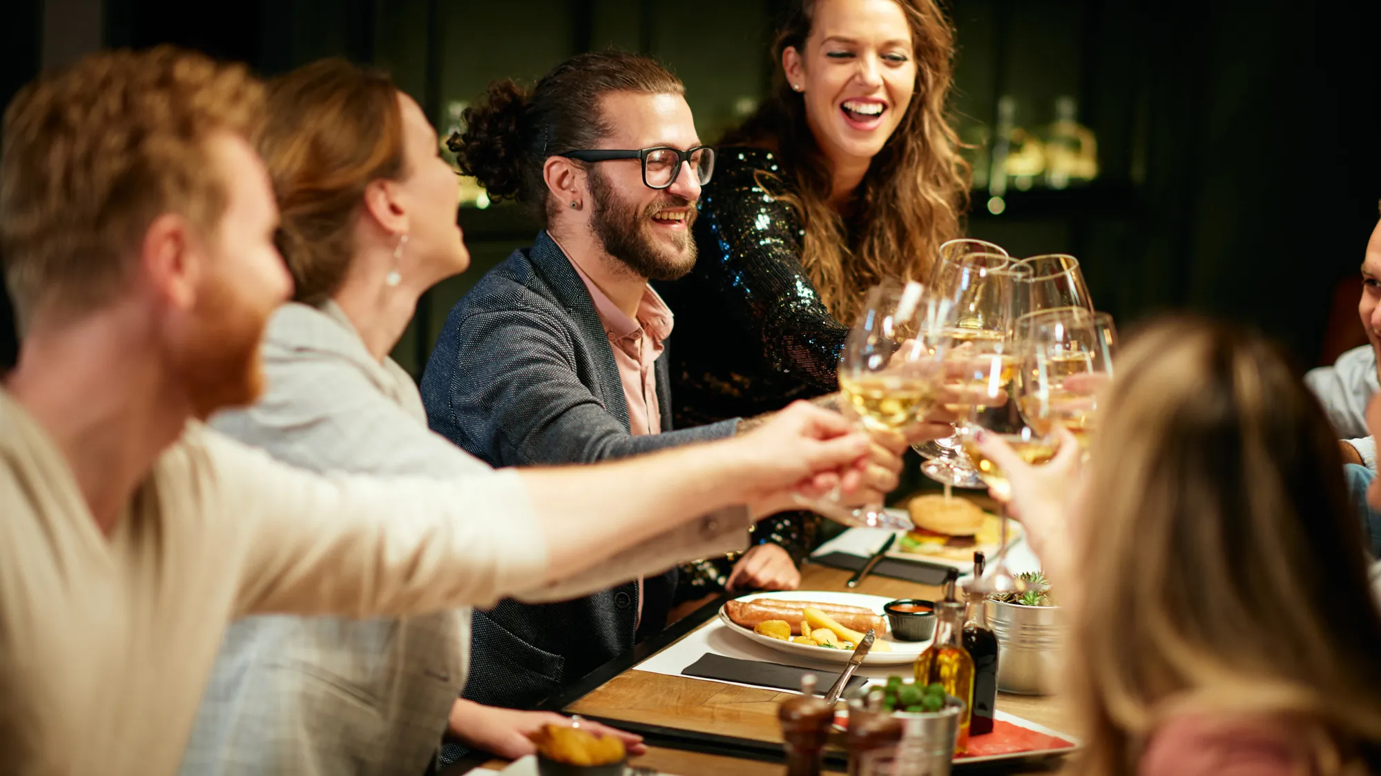 group of adults at dinner