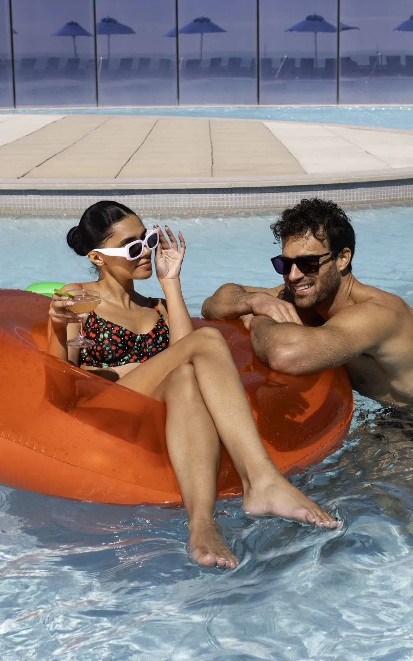 Two friends in a pool