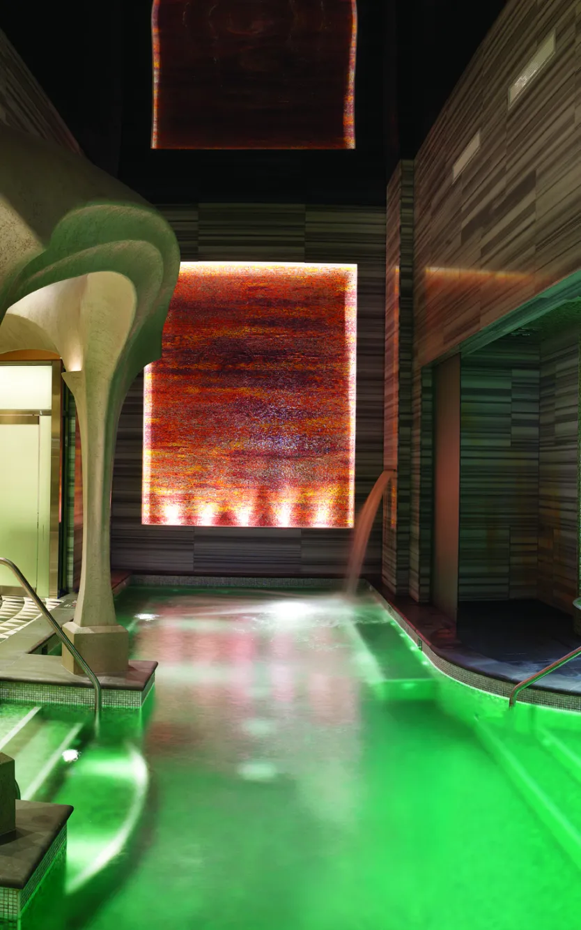 Luxurious Exhale Spa + Bathhouse at Ocean Casino Resort in Atlantic City, featuring hydrotherapy pool, mosaic tile seating, and relaxation lounges.