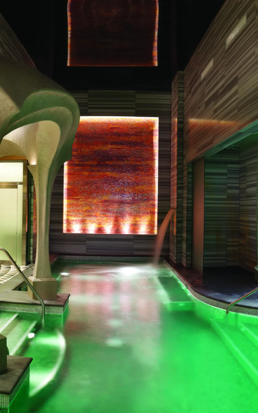 Luxurious Exhale Spa + Bathhouse at Ocean Casino Resort in Atlantic City, featuring hydrotherapy pool, mosaic tile seating, and relaxation lounges.