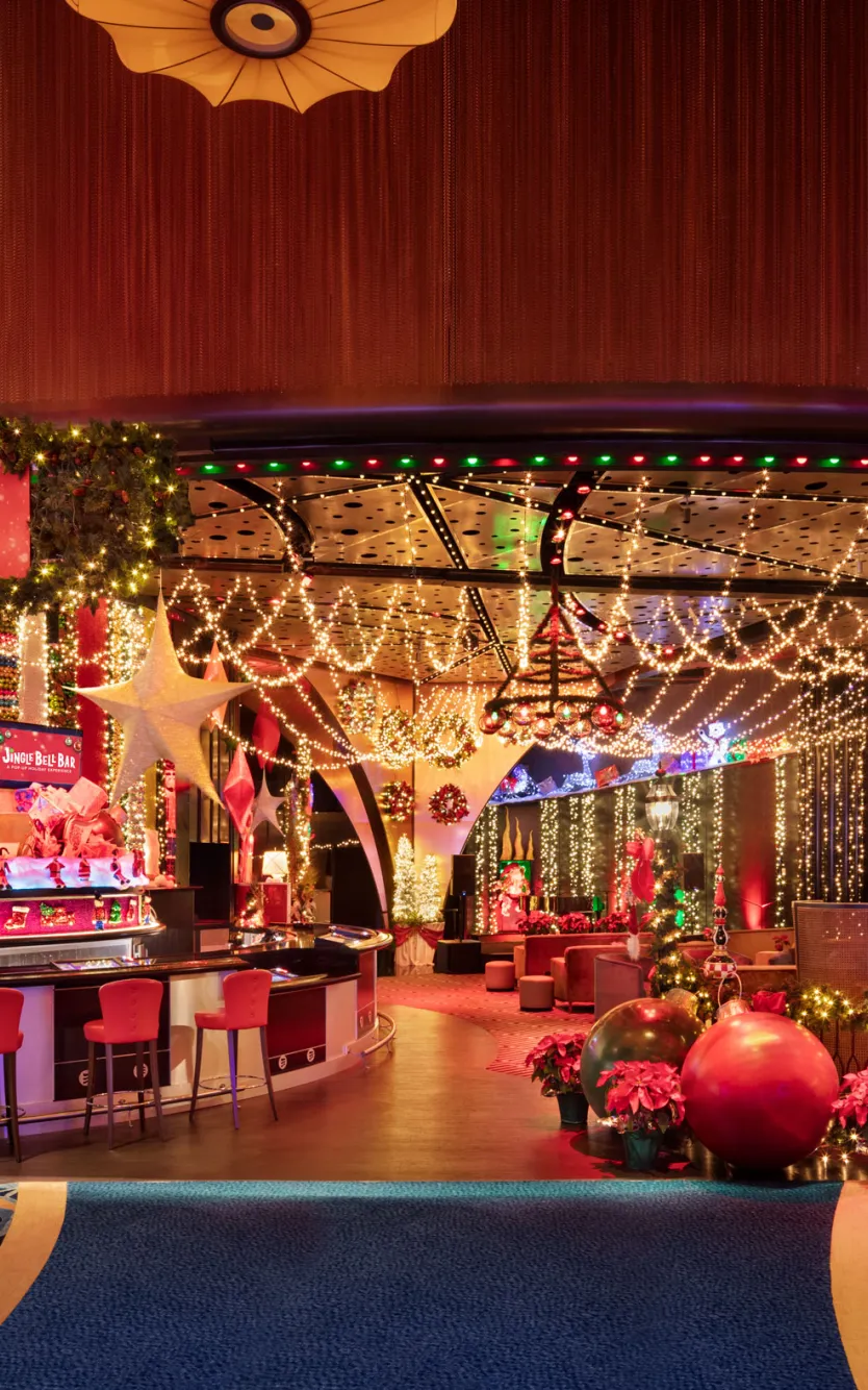 Festive Jingle Bell Bar at Ocean Casino Resort featuring holiday lights, décor, and themed cocktails.