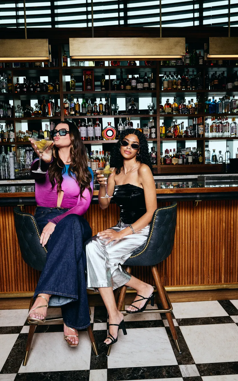 Two girls enjoying drinks at the bar at Ocean Steak in Ocean Casino Resort