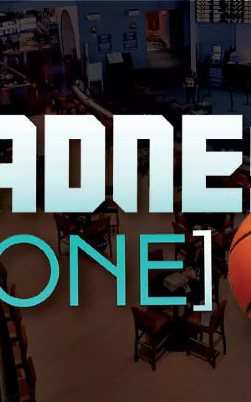 Image of sports betting venue with overlayed text "Madness Zone" and a graphic of a basketball