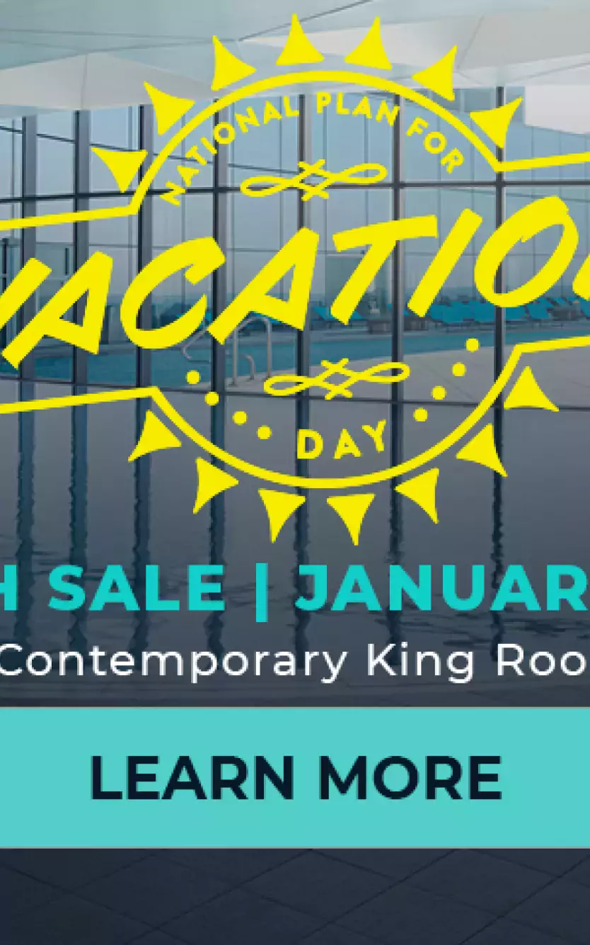 Image of indoor pool with overlayed text "National Plan for Vacation Day" 