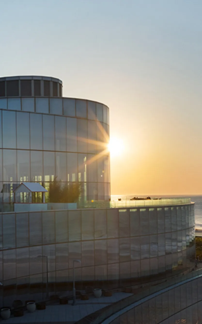 Ocean Casino Resort exterior against a sunrise