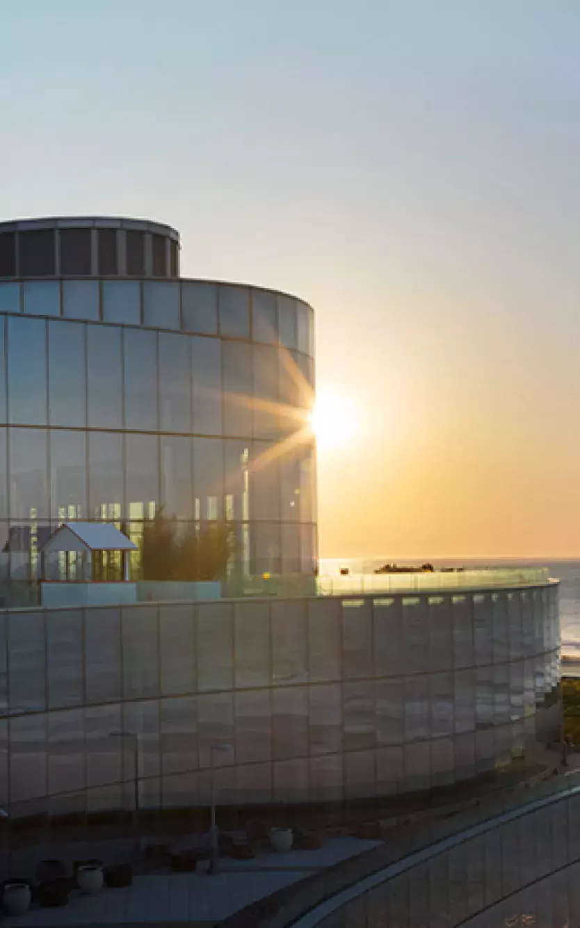 Ocean Casino Resort exterior against a sunrise