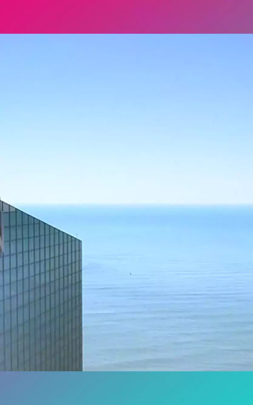 aerial view of top of Ocean Casino Resort with water in the background