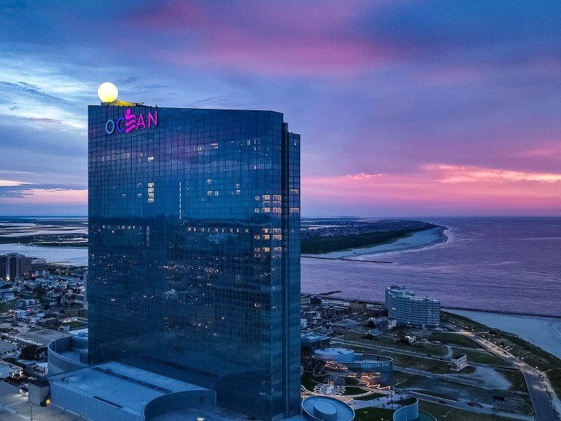 Ocean Casino Resort exterior against a sunrise