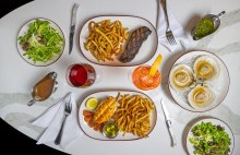 Steak frites, lobster tail, and cocktails at Ocean Casino Resort restaurant in Atlantic City