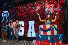 Patriotic photo opportunity at America's Birthday Bar during Fourth of July weekend at Ocean Casino Resort