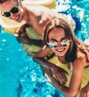 People on float in pool