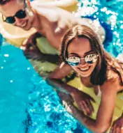 People on float in pool