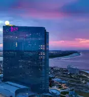 Ocean Casino Resort exterior against a sunrise