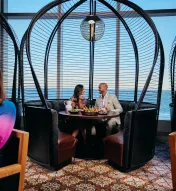 A couple sitting at a table in Amada at Ocean Casino Resort