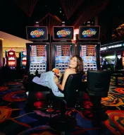 Woman sitting at a slot machine in Ocean Casino Resort