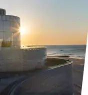 Exterior of Ocean Casino Resort with logos of different charities for Ocean Cares initiatives