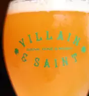 Three-image collage with fall-inspired drinks and dishes, including an orange beer, truffles and orange macarons