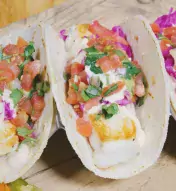 Various plated tacos at Distrito restaurant