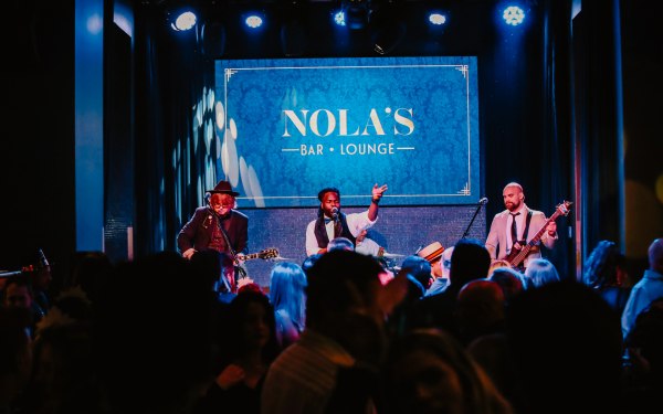 A band performing Music event at Nola 