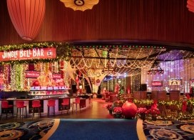 Festive Jingle Bell Bar at Ocean Casino Resort featuring holiday lights, décor, and themed cocktails.