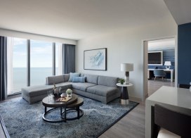 Oceanfront suite living room at Ocean Casino Resort with panoramic Atlantic Ocean views.