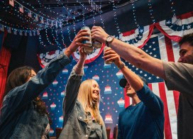 Friends raising a toast during Fourth of July celebrations at America's Birthday Bar at Ocean Casino Resort